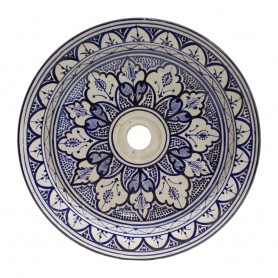 Lavabo rústico de cerámica decorado azul y blanco
