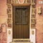 Puerta rústica modelo Alhambra con cristalera tapaluz